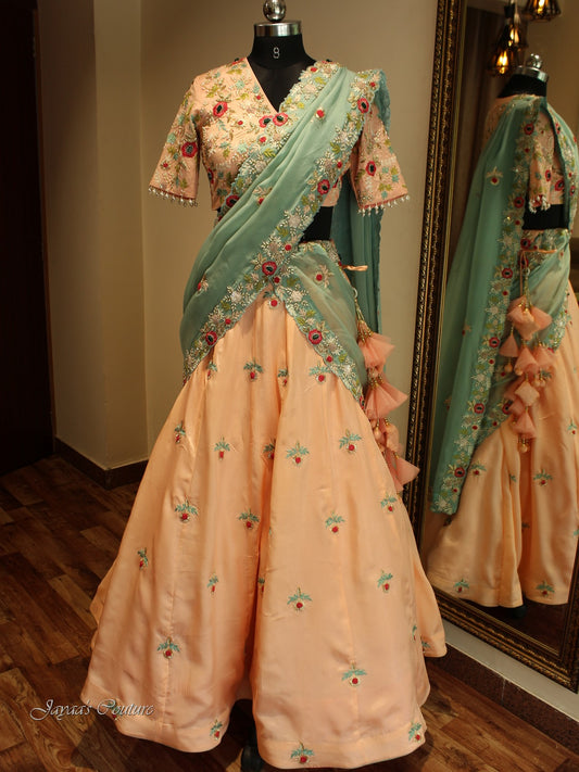 Peach lehenga blouse with sea green dupatta