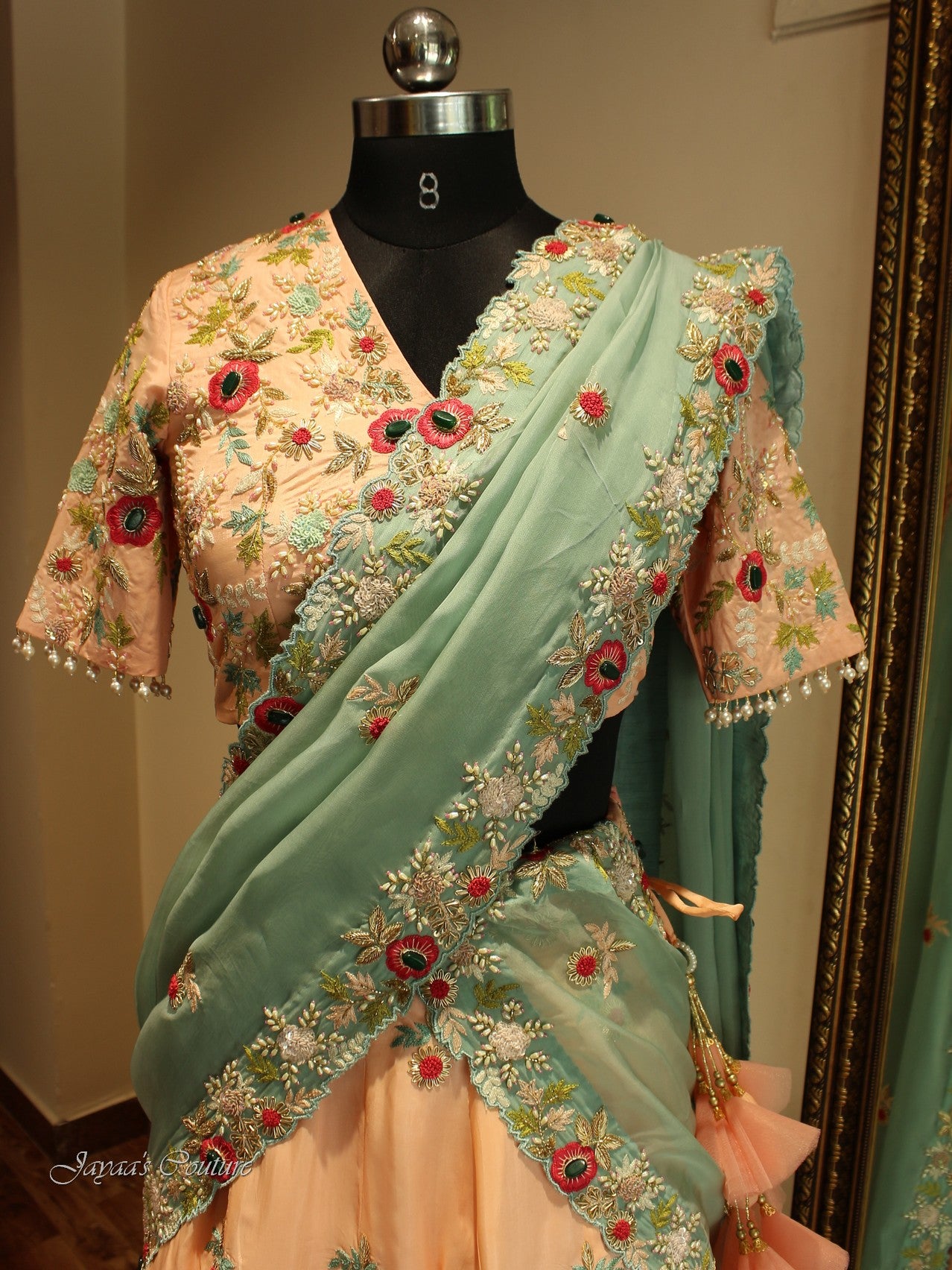 Peach lehenga blouse with sea green dupatta