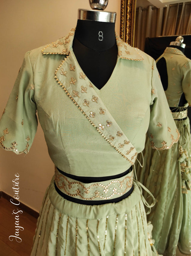 Pastel pista green angrakha blouse with lehenga and dupatta