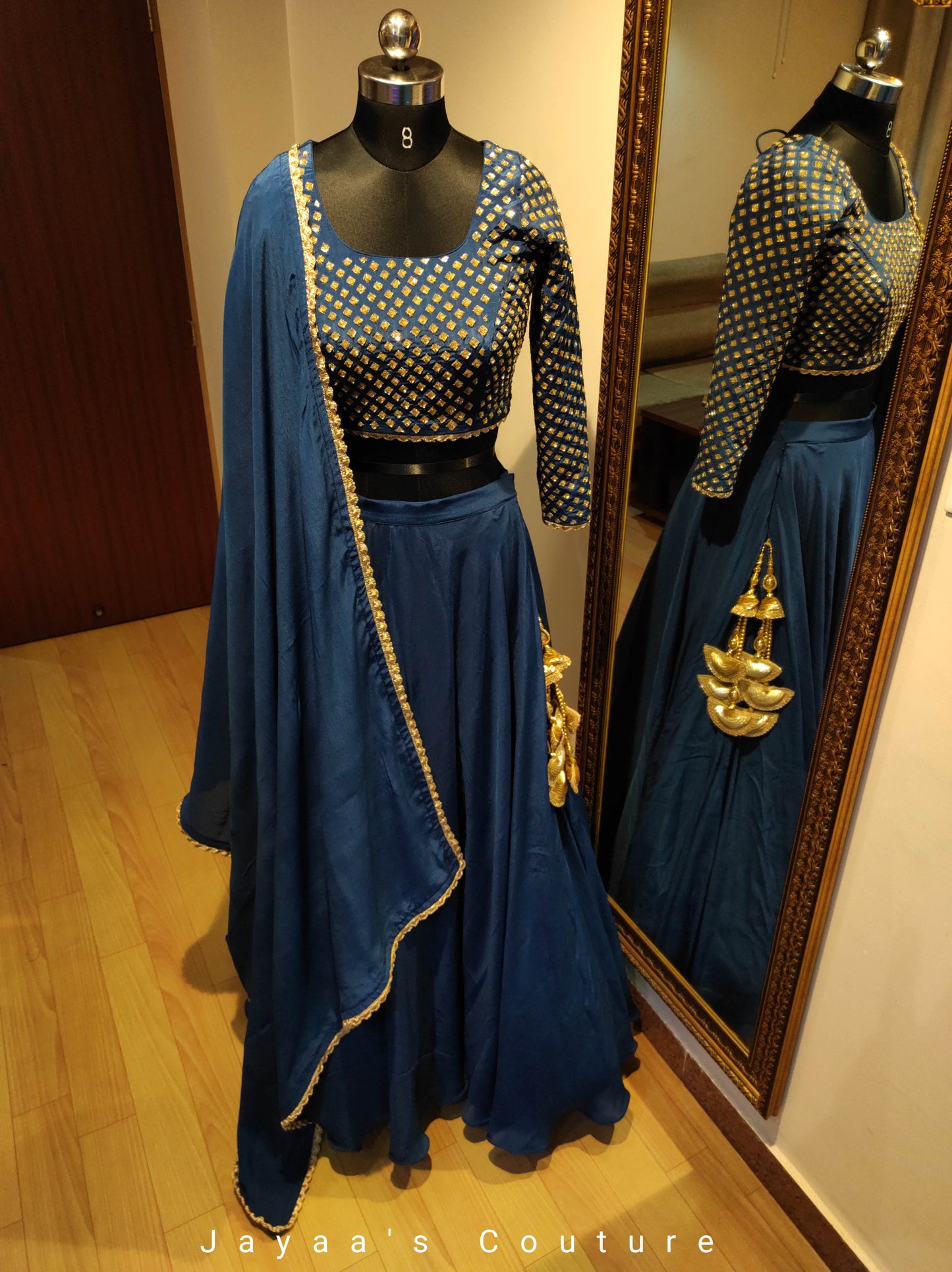 Peacock blue lehenga set with sequins work
