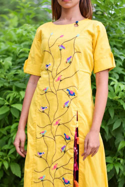 yellow embroidred kurti