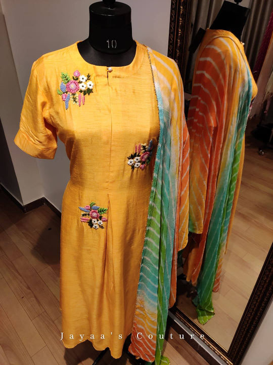 Mango yellow kurta pants paired with Beautiful multicolor leheriya Dupatta.