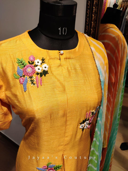 Mango yellow kurta pants paired with Beautiful multicolor leheriya Dupatta.