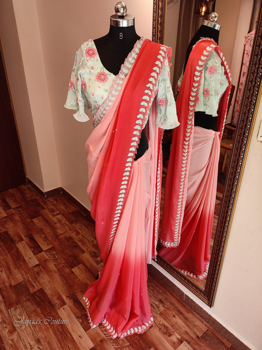 peachish red shaded saree with blouse