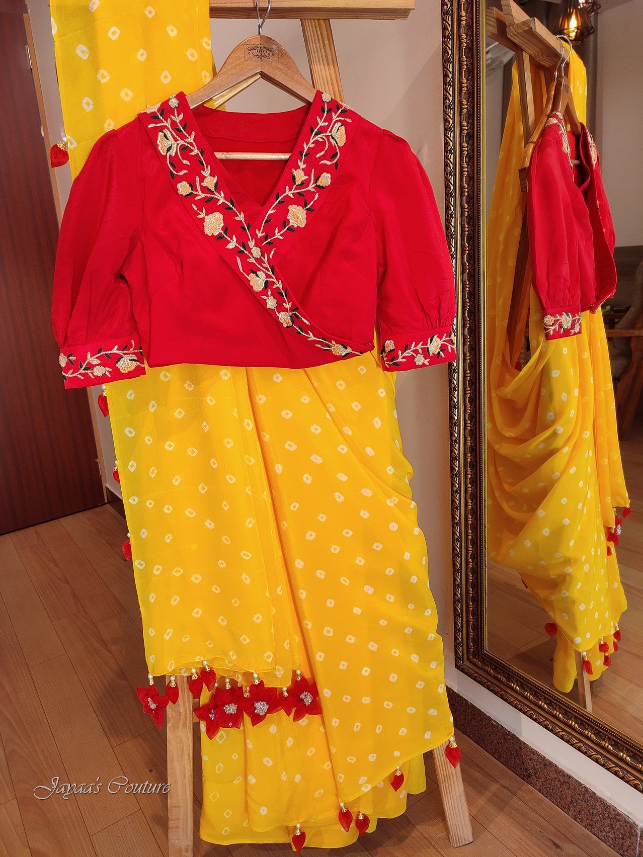 Yellow bandhej saree with rani blouse