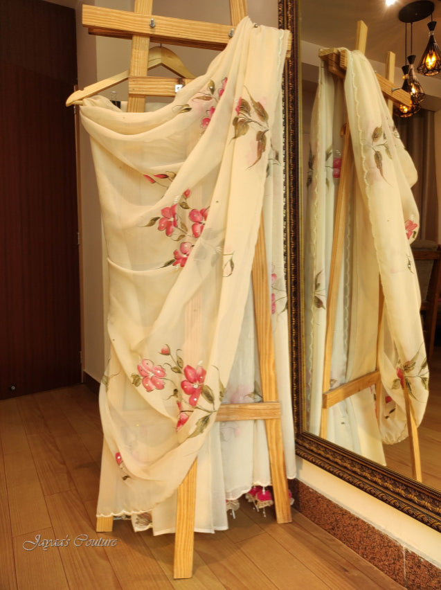 Off white hand painted saree with unstiched blouse