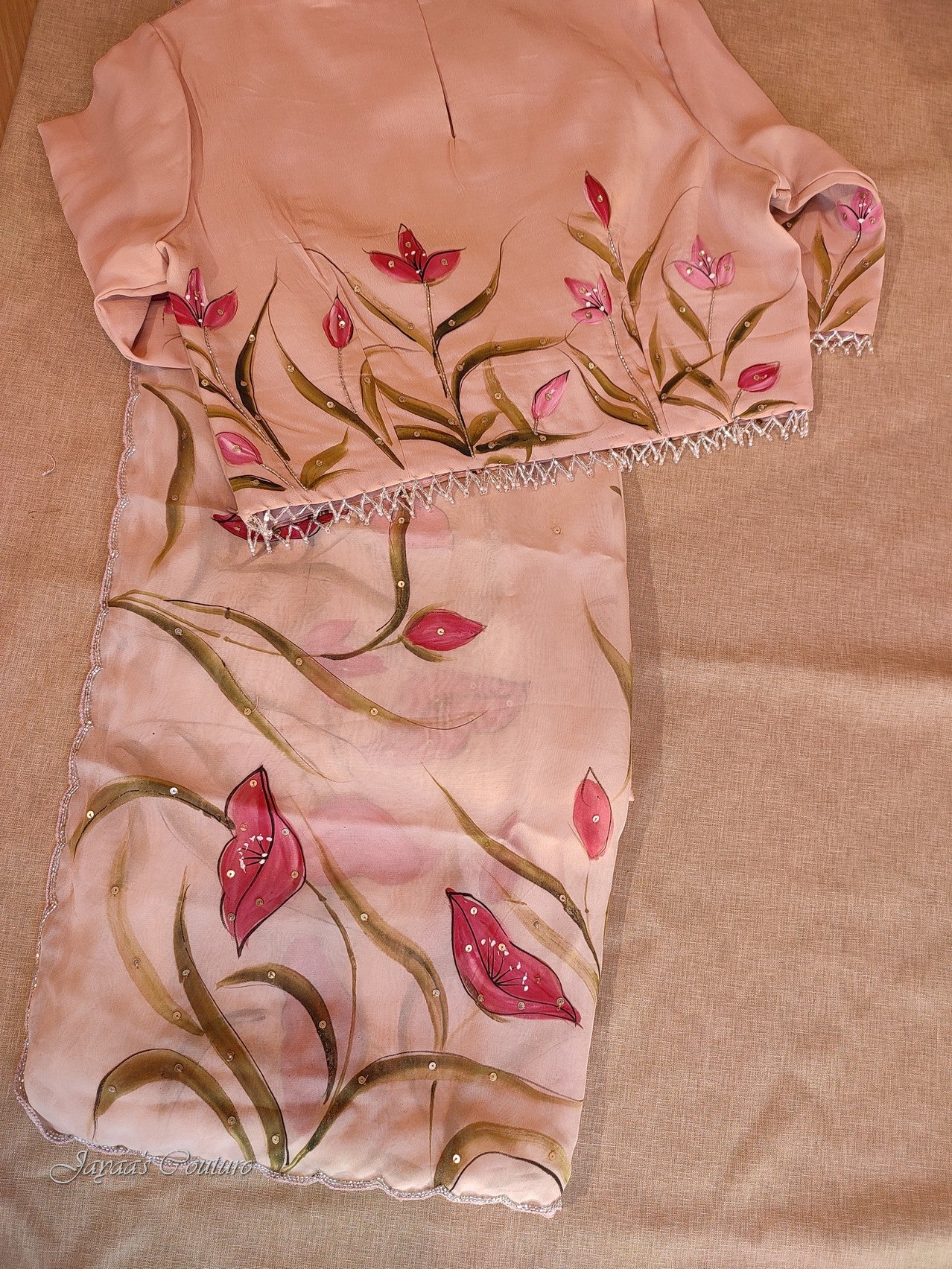 Dusty peach hand painted saree with blouse