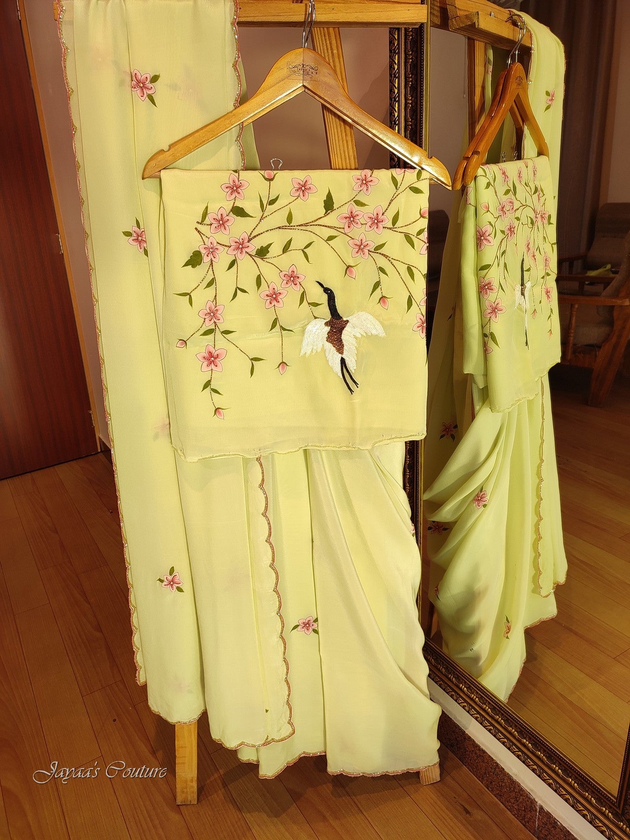 Lirl green handpainted saree with unstich blouse