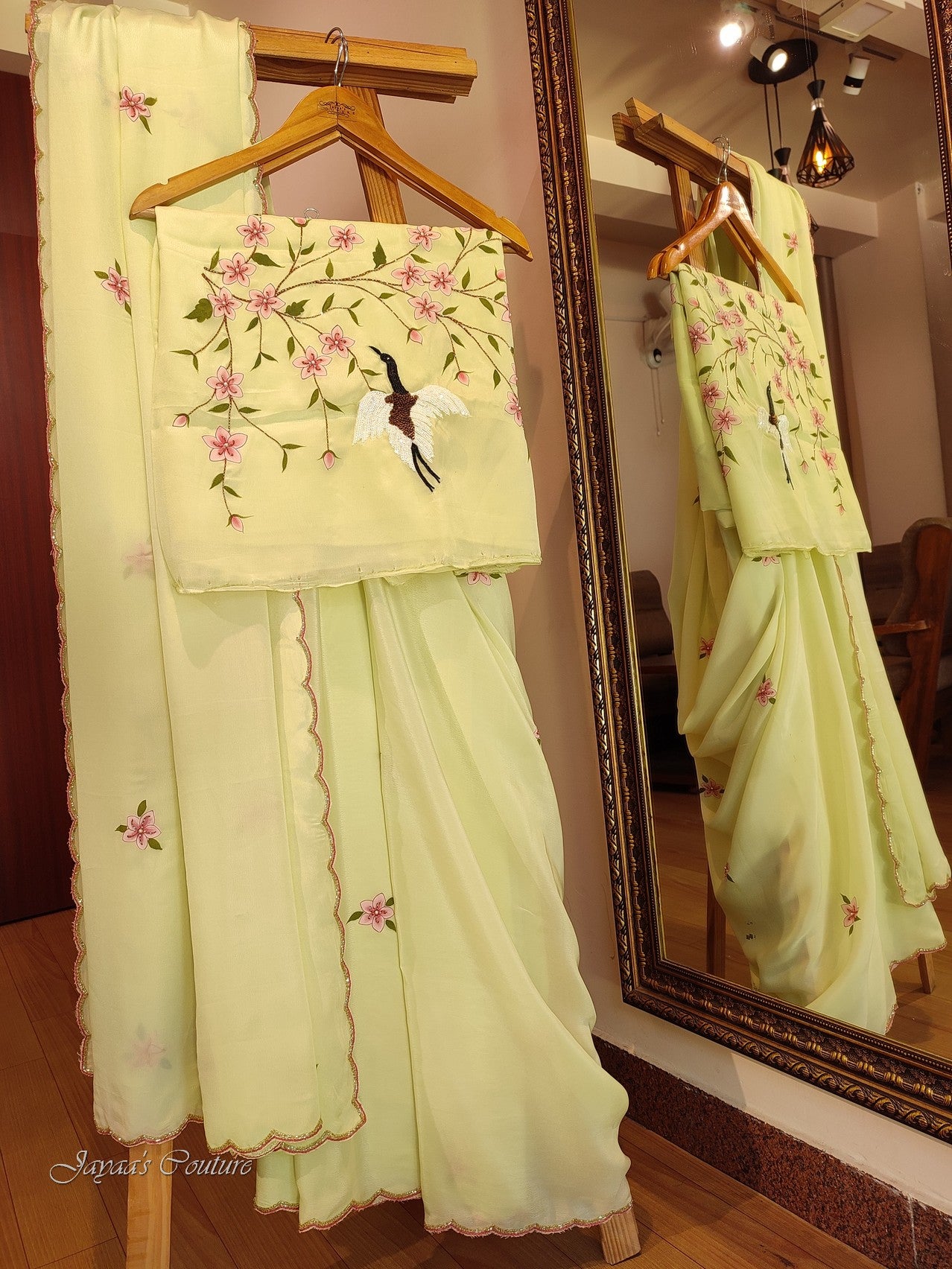 Lirl green handpainted saree with unstich blouse