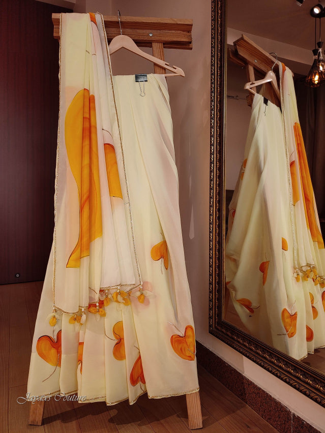 Off white yellow hand painted saree with blouse