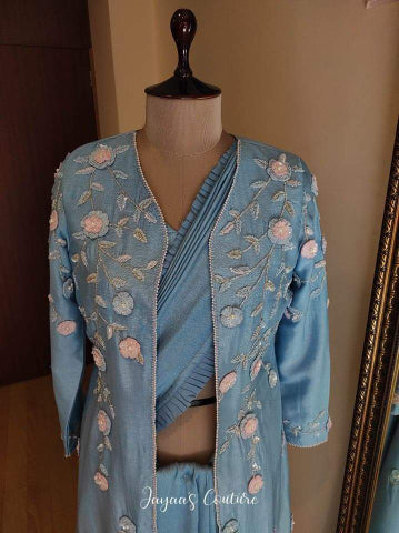 Powder blue saree blouse and shrug