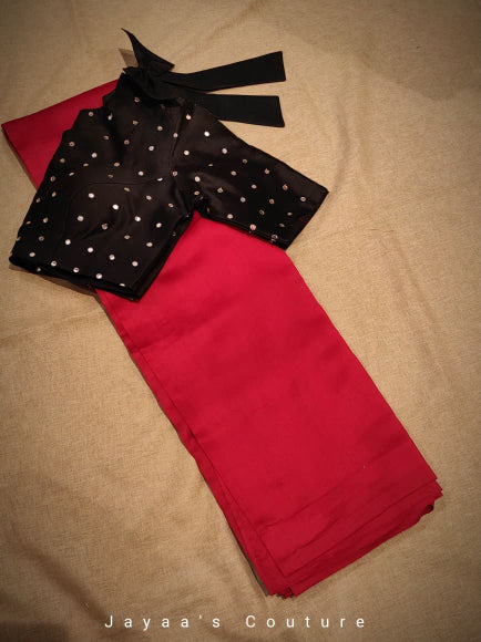 Red saree with black mirror work blouse