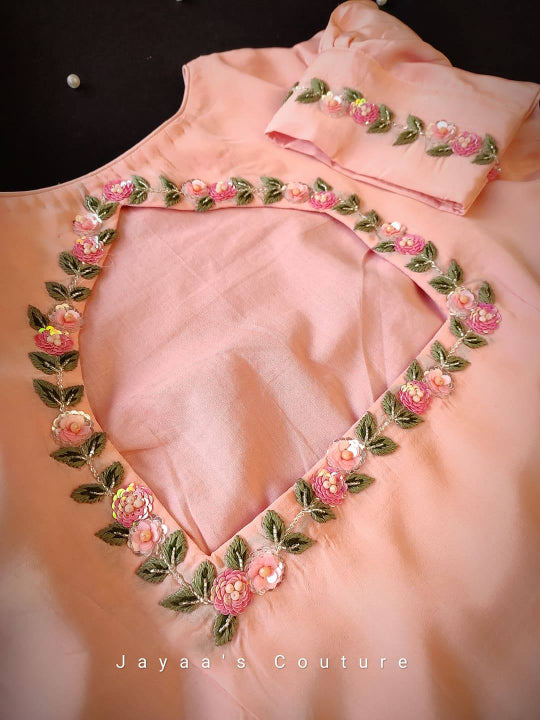 PEACH ORGANZA SAREE & CREPE BLOUSE ADORNED WITH HAND WORK