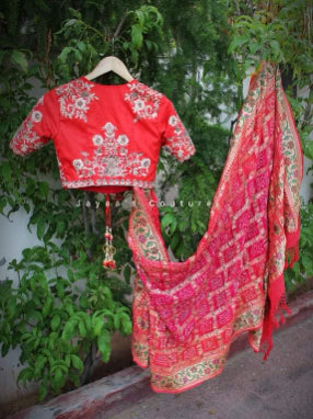 Banarsi Bandhej Saree paired up with raw silk Blouse Embellished with zardosi and sequins work