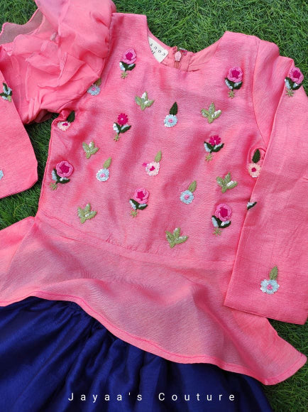Pastel pink peplum with blue skirt